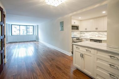 Prewar Transitional Gut Reno in Chelsea featuring kitchen and living area